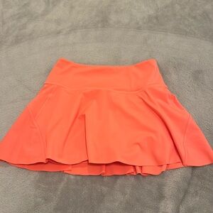 orange Athleta tennis skort